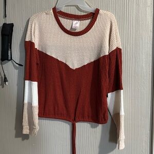 Brown and white cream shirt long sleeve adjustable at the bottom round neck